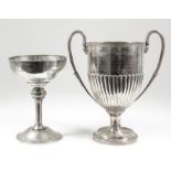 "Cricket Challenge Cup" - A late Victorian silver two-handled cup with reeded rim, leaf moulded