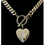 A modern 18ct gold mounted diamond heart shaped pendant, set with seven brilliant cut diamonds (