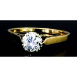 An 18ct gold mounted solitaire diamond ring, set with a round brilliant cut diamond (