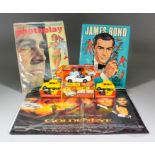 A collection of James Bond related items, including - a Corgi Toyota 2000GT No.336, in repro box,