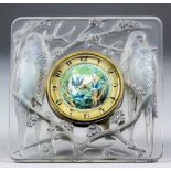 A 1930's Lalique moulded and pale blue opalescent glass square desk timepiece, moulded in relief