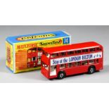 A Matchbox diecast Superfast Daimler bus, No. 74A, with labels to both sides "Stay at the London