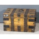 An 18th Century pine and metal bound trunk, the lid with studded initials "I.F." and dated 1789,