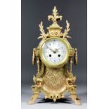 A late 19th Century French brass cased mantel clock, No. 685, the 3.75ins diameter white enamel dial