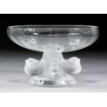 A modern Lalique "Coupe Nogent" clear glass footed bowl with four frosted glass wrens on base (