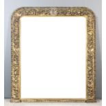 A 19th Century gilt framed overmantel mirror with egg and dart outer mouldings, the frame carved