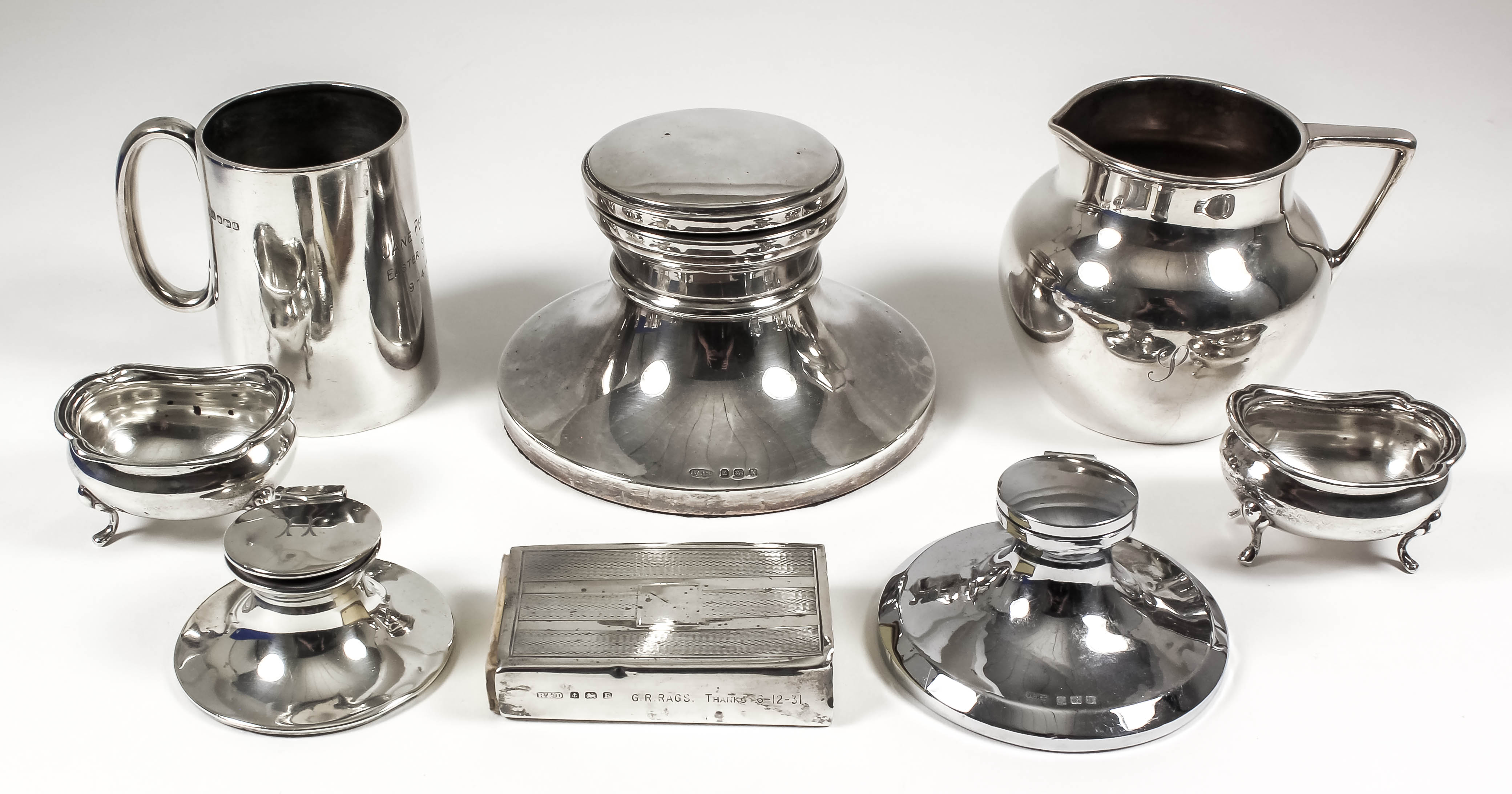 A George VI silver capstan pattern inkwell, 5ins diameter x 3.5ins high, by W. I. Broadway & Co,