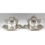 A good pair of early Victorian silver circular two-handled butter tubs, the integral stands with