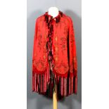A group of 19th/early 20th Century clothing and accessories, comprising - a beaded cape with