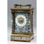 A late 19th Century French gilt brass and champleve enamel cased carriage clock by Louis Fernier &