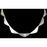 A modern silver "The Peaks" necklace, designed by Hans Hansen for Georg Jensen, 385mm overall (gross