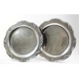 A pair of late 19th /early 20th Century Russian silvery metal circular plates of shaped outline