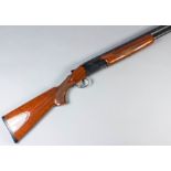 A 12 bore over and under shotgun by Classic Doubles Model 92, Serial No. TN11245, the 28ins