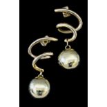 A pair of modern 14ct gold spiral drop earrings (for pierced ears), each hung with a circular