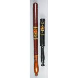 A Victorian oval-shaped truncheon, painted with "V.R." over crown over "I" over "Allerton", on a