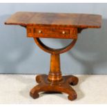 An early Victorian figured mahogany drop leaf work table, fitted one frieze drawer with panelled
