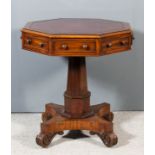 An early Victorian mahogany octagonal library table, the top inset with red leather and with moulded