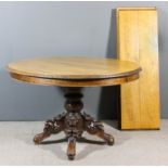 A 19th Century Continental oak oval extending dining table, with carved and moulded edge to top,