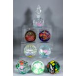 Fourteen limited edition Caithness glass paperweights, including - five for Peter Jones "Diamond