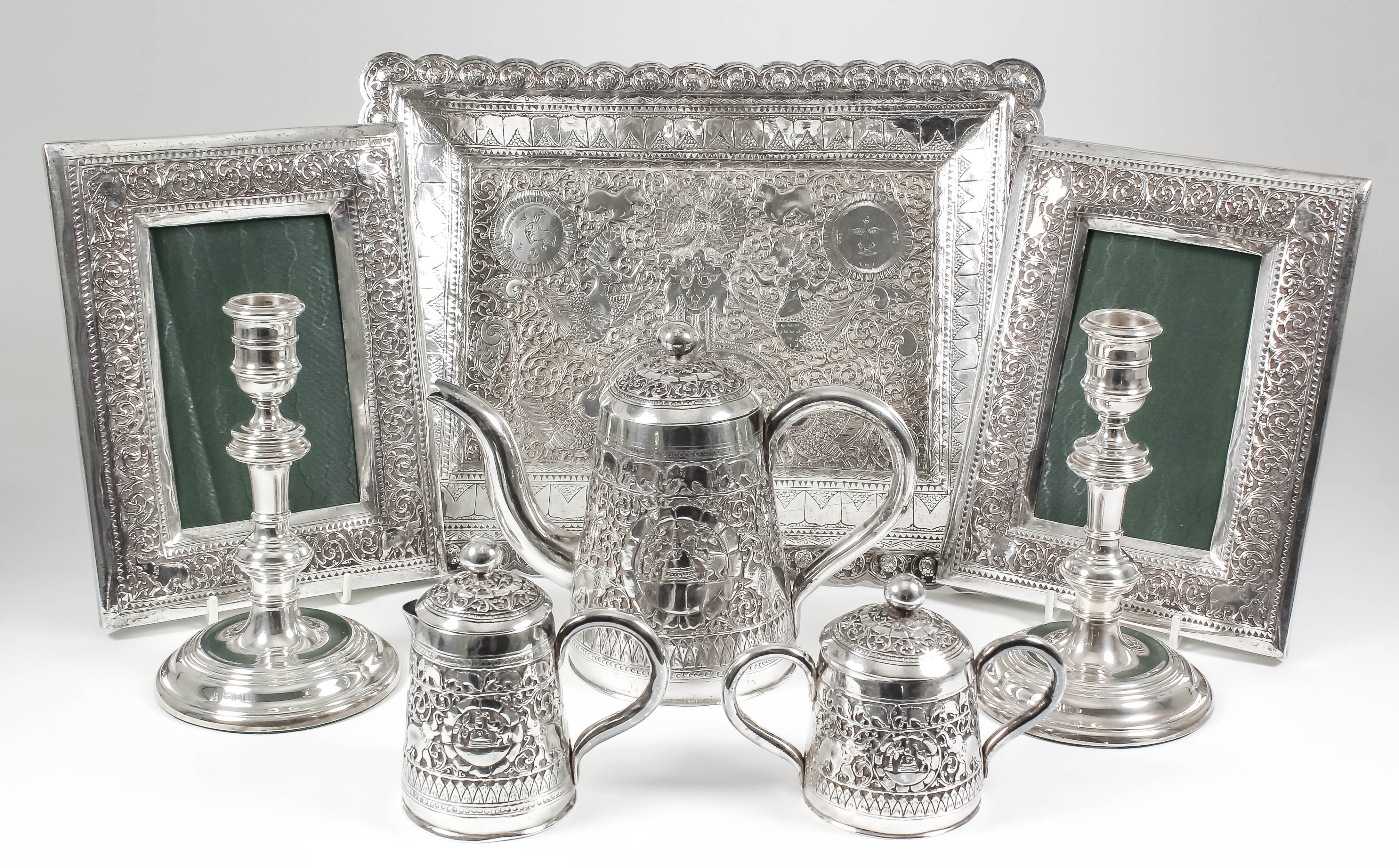 A pair of Elizabeth II silver pillar candlesticks with knopped stems, on circular moulded bases, 6.
