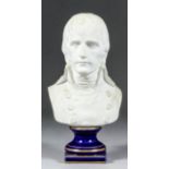 A 19th Century French white bisque porcelain bust of Napoleon as First Consul, on blue and gilt