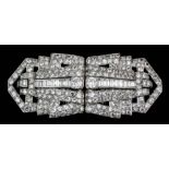 A good pair of 1930's platinum mounted and all diamond set dress clips in the Art Deco manner, set