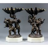 After Auguste Leveque (1864-1921) - Pair of green/brown patinated bronze groups, each modelled as