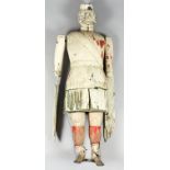 A 19th Century white painted carved wood "Whirligig" in the form of a Highland soldier, 24.25ins