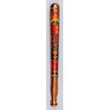 A Victorian turned wood truncheon, painted with crown over royal arms within garter and buckle, over