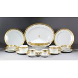 A C.H. Haviland Limoges porcelain part dinner service, decorated in white and gold with raised