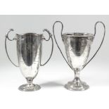 "Folkestone Cricket Club Sports" - A George V silver two-handled cup with reeded and ribbon