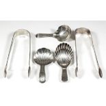 Three George III silver caddy spoons - with shell bowl and bright cut handle, engraved with initials