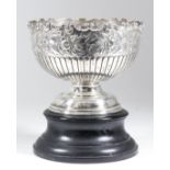 An Edward VII silver circular rose bowl, the shaped and moulded rim with scroll and shell mounts,