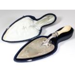 A Victorian silver presentation trowel with turned ivory and cast silver handle, the blade