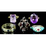 Two 9ct gold mounted amethyst rings, one with oval amethyst, the other with rectangular amethyst,