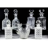 A pair of 19th Century glass claret decanters of mallet form, 8ins high, with target stoppers, the