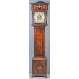 An 18th Century Dutch oak longcase clock by Pieter Klock of Amsterdam, the 12.25ins square brass