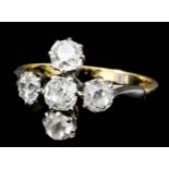 A late 19th/early 20th Century 18ct gold mounted five stone diamond ring, set with five old cut