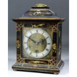 A 20th Century black japanned and gilt decorated timepiece by Astral, No. 21316, the 5ins square