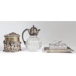 A Victorian plated and hobnail cut glass bulbous claret jug, the plated mounts with fluted fan and