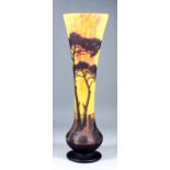 A good 20th Century Daum cameo glass tall vase overlaid in mauve glass on a yellow/orange mottled