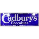 An early 20th Century enamelled rectangular advertising sign "Cadbury's Chocolate" in blue and