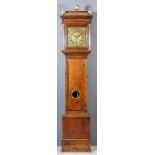 An 18th Century oak longcase clock by John Mercer of Hythe, the 11ins square brass dial with wide