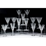 A glass part table service with slice cut bowls and stems, comprising - ten 6.5ins wine glasses