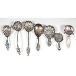 A late Victorian silver caddy spoon with shell pattern bowl, spiral twist and moulded pierced