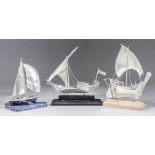 A 20th Century silvery metal and lapis lazuli model of a yacht, 6ins x 7ins high (stamped "925"