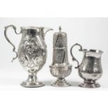 A late Victorian silver bulbous jug with scroll handle, the body embossed with scroll cartouche,