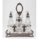 A Victorian silver rectangular seven-division cruet stand of shaped outline with reeded and bead