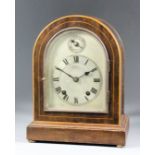 An early 20th Century German mahogany and bevelled glass cased mantel clock by Winterhalder &
