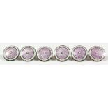 A set of six Edward VII silver, lilac and white enamel circular buttons with engine turned ornament,